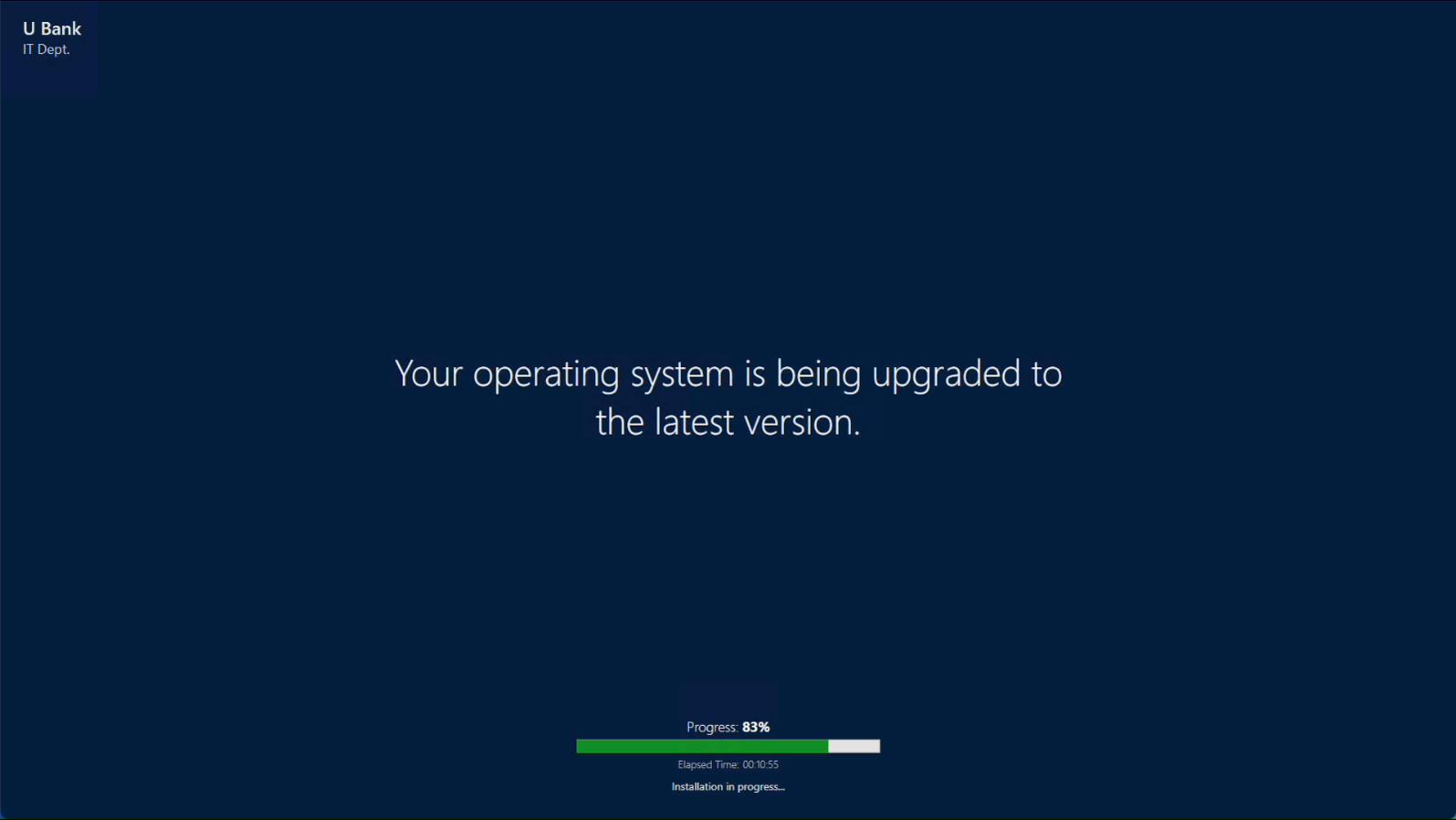 Locked installation screen showing Your operating system is being upgraded with progress bar at 83% and elapsed time